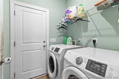 This beautiful 4-bedroom, 2.5-bath perfectly positioned on a on Woodlake Country Club in North Carolina - for sale on GolfHomes.com, golf home, golf lot