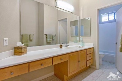 This pristine 2 bedroom PLUS den/office, and 2 full bath on Rancho Mirage Country Club in California - for sale on GolfHomes.com, golf home, golf lot