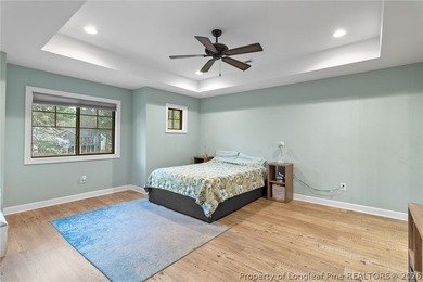 This beautiful 4-bedroom, 2.5-bath perfectly positioned on a on Woodlake Country Club in North Carolina - for sale on GolfHomes.com, golf home, golf lot