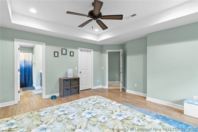 This beautiful 4-bedroom, 2.5-bath perfectly positioned on a on Woodlake Country Club in North Carolina - for sale on GolfHomes.com, golf home, golf lot