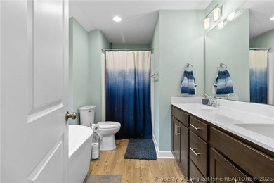 This beautiful 4-bedroom, 2.5-bath perfectly positioned on a on Woodlake Country Club in North Carolina - for sale on GolfHomes.com, golf home, golf lot