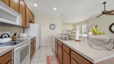 BRIGHT and CHEERFUL, three bedroom, two bathroom, FIRST FLOOR on Capri Isle Golf Club in Florida - for sale on GolfHomes.com, golf home, golf lot