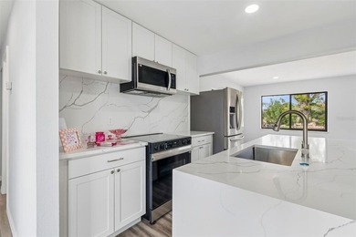 Beautifully renovated 4-BEDROOM, 2-BATH home offering just over on Jacaranda West Country Club in Florida - for sale on GolfHomes.com, golf home, golf lot