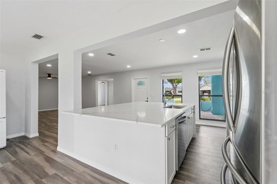 Beautifully renovated 4-BEDROOM, 2-BATH home offering just over on Jacaranda West Country Club in Florida - for sale on GolfHomes.com, golf home, golf lot