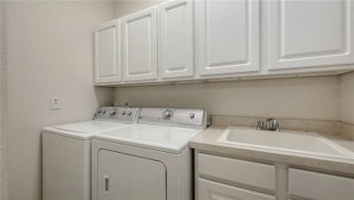 BRIGHT and CHEERFUL, three bedroom, two bathroom, FIRST FLOOR on Capri Isle Golf Club in Florida - for sale on GolfHomes.com, golf home, golf lot
