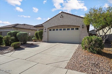 Built in 2007, this Florence single story home offers a mix of on Poston Butte Golf Club in Arizona - for sale on GolfHomes.com, golf home, golf lot