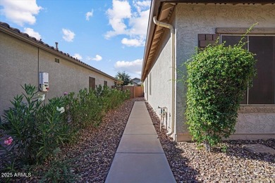 Built in 2007, this Florence single story home offers a mix of on Poston Butte Golf Club in Arizona - for sale on GolfHomes.com, golf home, golf lot
