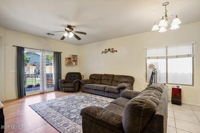 Built in 2007, this Florence single story home offers a mix of on Poston Butte Golf Club in Arizona - for sale on GolfHomes.com, golf home, golf lot