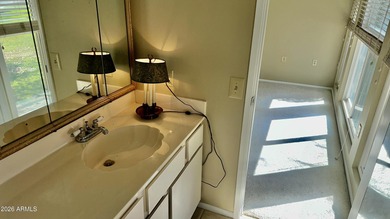 Charming Gemini move-in-ready, freshly painted, light and bright on PalmBrook Country Club in Arizona - for sale on GolfHomes.com, golf home, golf lot