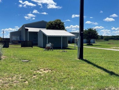 Dive into beautiful Lake Proctor, just a stone's throw from this on P.A.R. Country Club in Texas - for sale on GolfHomes.com, golf home, golf lot