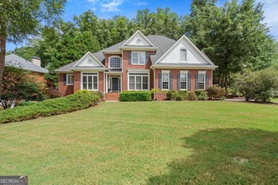 Experience resort-style living perfectly positioned on a private on Woodmont Golf and Country Club in Georgia - for sale on GolfHomes.com, golf home, golf lot