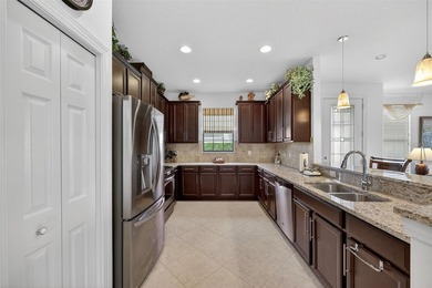 This 2-bed home in Esplanade Lakewood Ranch features tranquil on Esplanade Golf and Country at Lakewood Ranch in Florida - for sale on GolfHomes.com, golf home, golf lot