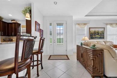 This 2-bed home in Esplanade Lakewood Ranch features tranquil on Esplanade Golf and Country at Lakewood Ranch in Florida - for sale on GolfHomes.com, golf home, golf lot