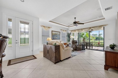 This 2-bed home in Esplanade Lakewood Ranch features tranquil on Esplanade Golf and Country at Lakewood Ranch in Florida - for sale on GolfHomes.com, golf home, golf lot