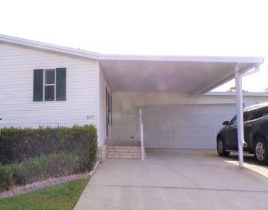 Welcome to this nice and quaint 2-bedroom home, complete with a on Schalamar Creek Golf and Country Club in Florida - for sale on GolfHomes.com, golf home, golf lot