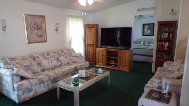 Welcome to this nice and quaint 2-bedroom home, complete with a on Schalamar Creek Golf and Country Club in Florida - for sale on GolfHomes.com, golf home, golf lot