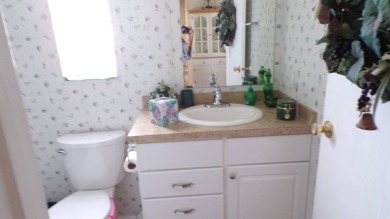 Welcome to this nice and quaint 2-bedroom home, complete with a on Schalamar Creek Golf and Country Club in Florida - for sale on GolfHomes.com, golf home, golf lot