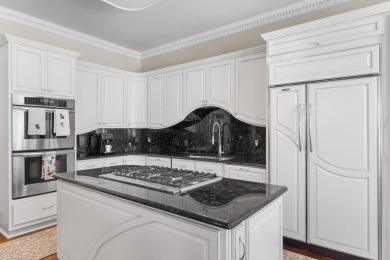 Welcome to 434 Captains Circle--an extraordinary on Regatta Bay Golf and Country Club in Florida - for sale on GolfHomes.com, golf home, golf lot