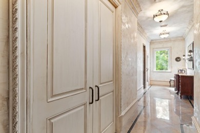 Welcome to 434 Captains Circle--an extraordinary on Regatta Bay Golf and Country Club in Florida - for sale on GolfHomes.com, golf home, golf lot