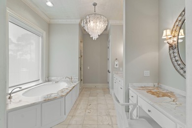 Welcome to 434 Captains Circle-an extraordinary on Regatta Bay Golf and Country Club in Florida - for sale on GolfHomes.com, golf home, golf lot