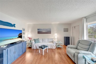 Turn Key,  this bright and cozy 2/2 condo features new luxury on The American Golf Club in Florida - for sale on GolfHomes.com, golf home, golf lot