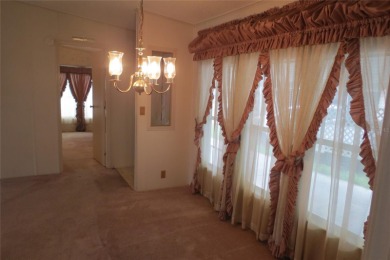 BETMAR ESTATES (55+ Community) 3BR/2BA/HUGE CARPORT Home with on Betmar Acres Golf Club in Florida - for sale on GolfHomes.com, golf home, golf lot