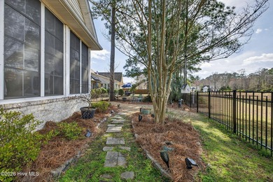 Welcome to this beautifully maintained brick home in the on Magnolia Greens Golf Plantation in North Carolina - for sale on GolfHomes.com, golf home, golf lot