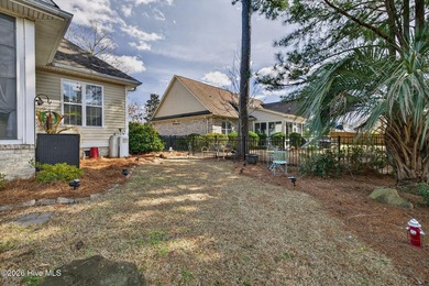 Welcome to this beautifully maintained brick home in the on Magnolia Greens Golf Plantation in North Carolina - for sale on GolfHomes.com, golf home, golf lot
