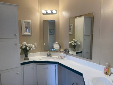 Experience Privacy, Modern Comfort, and Resort-Style Living - on Four Lakes Golf Club in Florida - for sale on GolfHomes.com, golf home, golf lot