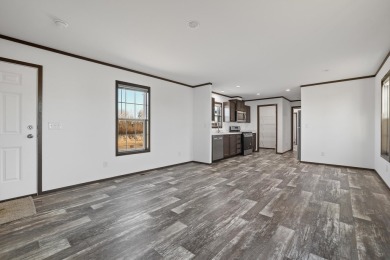 Listed by Michelle Carr  Lori Barnett, Engel  Volkers Black on Rapid City Elks Golf Course in South Dakota - for sale on GolfHomes.com, golf home, golf lot