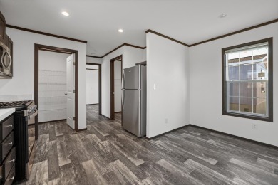 Listed by Michelle Carr  Lori Barnett, Engel  Volkers Black on Rapid City Elks Golf Course in South Dakota - for sale on GolfHomes.com, golf home, golf lot