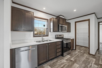 Listed by Michelle Carr  Lori Barnett, Engel  Volkers Black on Rapid City Elks Golf Course in South Dakota - for sale on GolfHomes.com, golf home, golf lot