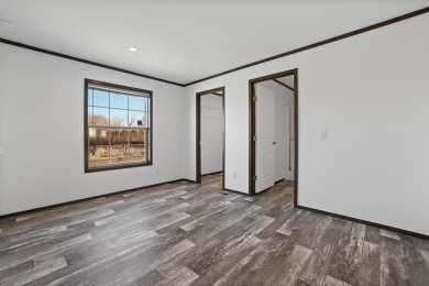 Listed by Michelle Carr  Lori Barnett, Engel  Volkers Black on Rapid City Elks Golf Course in South Dakota - for sale on GolfHomes.com, golf home, golf lot