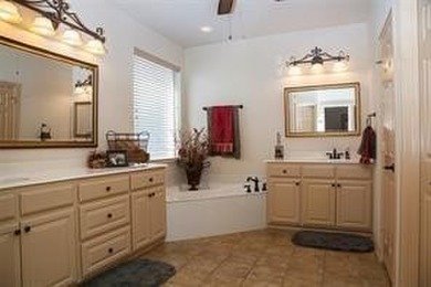 Beautiful home in highly sought after Master planned golf course on Heritage Lakes - Par 3 - 9 Hole Course in Texas - for sale on GolfHomes.com, golf home, golf lot