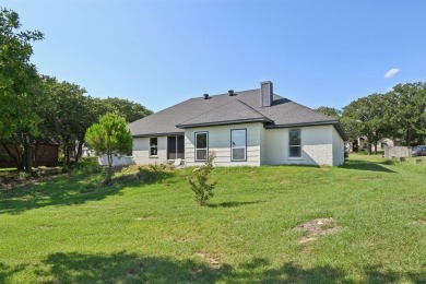 Fully updated home located on an almost 1 acre lot on the Brazos on Pecan Plantation Country Club in Texas - for sale on GolfHomes.com, golf home, golf lot