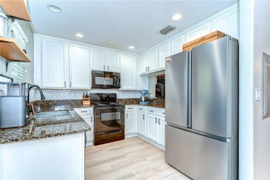 Welcome to this beautifully updated 2-bedroom, 2.5-bath on Summerfield Crossing Golf Club in Florida - for sale on GolfHomes.com, golf home, golf lot