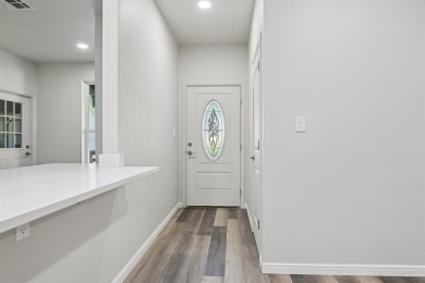 Fully updated home located on an almost 1 acre lot on the Brazos on Pecan Plantation Country Club in Texas - for sale on GolfHomes.com, golf home, golf lot