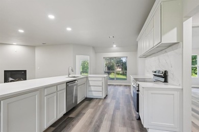 Fully updated home located on an almost 1 acre lot on the Brazos on Pecan Plantation Country Club in Texas - for sale on GolfHomes.com, golf home, golf lot