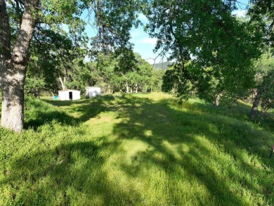 Charming 1,733 sqft home on 1.38 acres of versatile land on Yosemite Lakes Park Golf Course in California - for sale on GolfHomes.com, golf home, golf lot