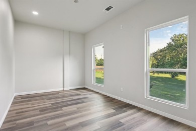 Fully updated home located on an almost 1 acre lot on the Brazos on Pecan Plantation Country Club in Texas - for sale on GolfHomes.com, golf home, golf lot