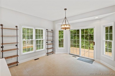 Enjoy a *Lock it and Leave It* lifestyle at this comfortable on The Club At Porto Cima in Missouri - for sale on GolfHomes.com, golf home, golf lot