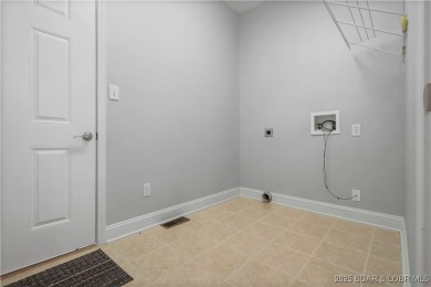 Enjoy a *Lock it and Leave It* lifestyle at this comfortable on The Club At Porto Cima in Missouri - for sale on GolfHomes.com, golf home, golf lot