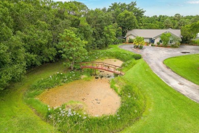 TRANQUIL RETREAT IN CRANE CREEK COUNTRY CLUB!!! Experience the on Martin Downs Country Club in Florida - for sale on GolfHomes.com, golf home, golf lot
