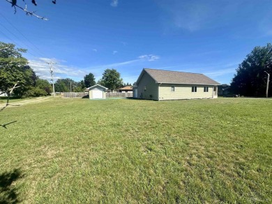 This home offers a rare opportunity to put your own finishing on Escanaba Country Club in Michigan - for sale on GolfHomes.com, golf home, golf lot
