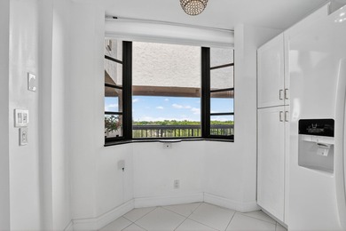 Penthouse Two Bedroom Two Bath unit with endless lake and golf on The Country Club At Boca Raton in Florida - for sale on GolfHomes.com, golf home, golf lot