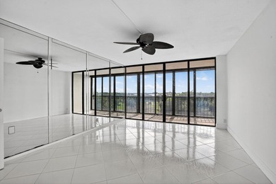 Penthouse Two Bedroom Two Bath unit with endless lake and golf on The Country Club At Boca Raton in Florida - for sale on GolfHomes.com, golf home, golf lot