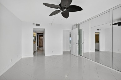 Penthouse Two Bedroom Two Bath unit with endless lake and golf on The Country Club At Boca Raton in Florida - for sale on GolfHomes.com, golf home, golf lot