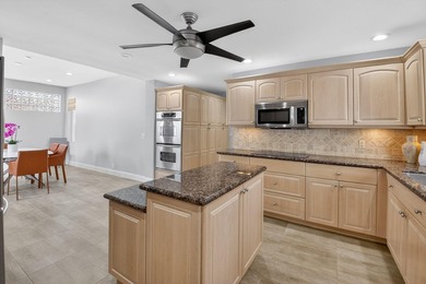 Experience the pinnacle of open-concept living in this on  in Florida - for sale on GolfHomes.com, golf home, golf lot