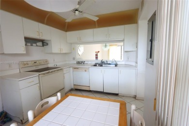The Best in Sunrise Lakes, Phase IV. Needs a little TLC. 2/2 on Sunrise Lakes Phase IV Golf Course in Florida - for sale on GolfHomes.com, golf home, golf lot