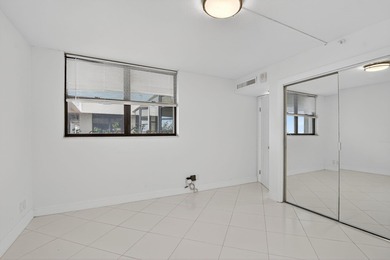 Penthouse Two Bedroom Two Bath unit with endless lake and golf on The Country Club At Boca Raton in Florida - for sale on GolfHomes.com, golf home, golf lot